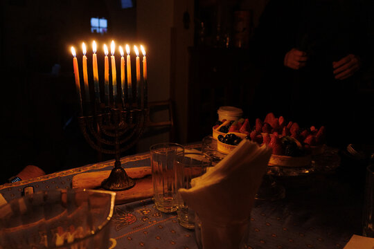 All eight lights on the menorah for the final night of Hannukah