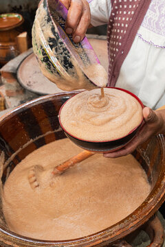 Serving agua de barranca, a cacao Drink in Artistic Bowl