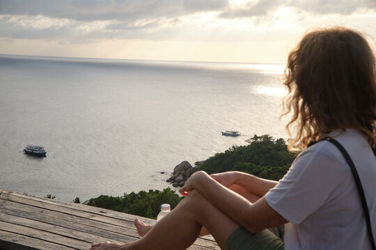 Sitting Above the Sea at Sunset Time