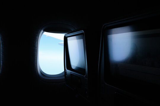 Framed Sky Inside an Airplane