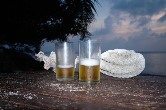 Beer and Shells at Sunset