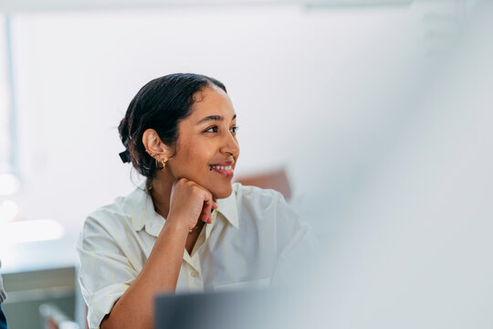 Businesswoman Smiling In Office At Work