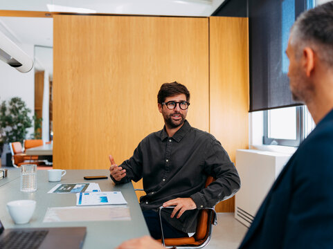 Casual Business Meeting In Modern Office