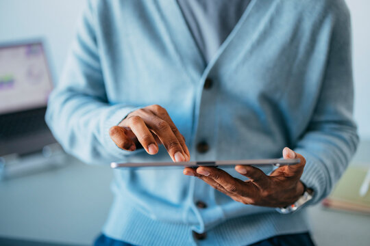 Man Using Tablet At Work