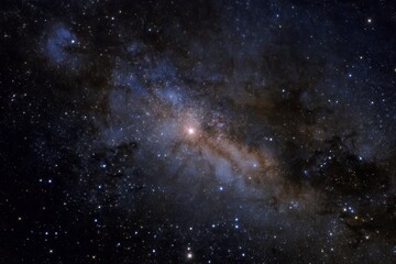 Fototapeta premium Milky Way core glows with bright stars, orange nebulosity, dark dust clouds, intricate stellar structures, and cosmic dust lanes in high detail.