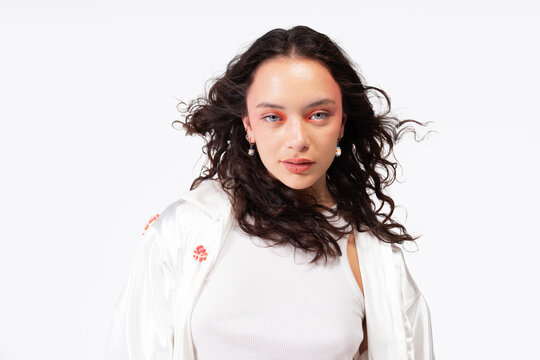 Modern fashion editorial with minimal backdrop