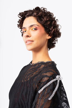 Editorial fashion look with clean white backdrop