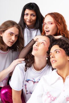 Five women celebrating friendship through fashion