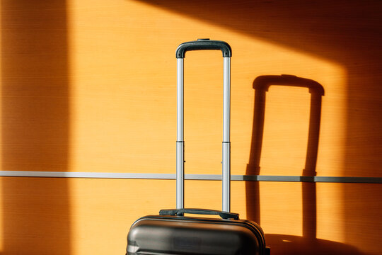 Travel suitcase ready for packing in bright space