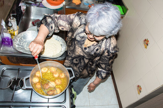 Cooking in a Kitchen During Afternoon Hours