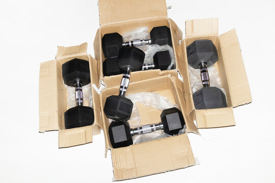 New beginnings: unboxing dumbbell weights and starting working out