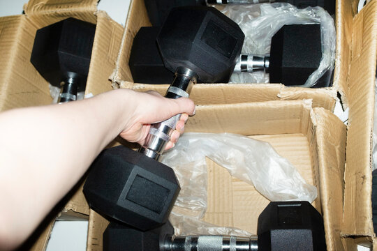 New beginnings: unboxing dumbbell weights and starting working out