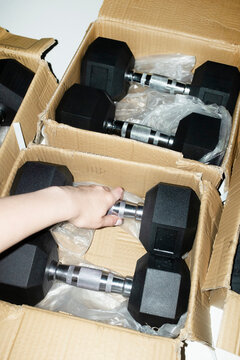 New beginnings: unboxing dumbbell weights and starting working out