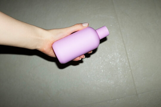 Pastel baby pink plastic mockup bottles with space for text or design