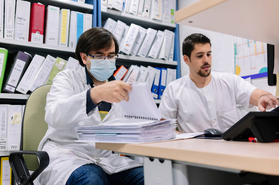 Healthcare professionals working in hospital pharmacy