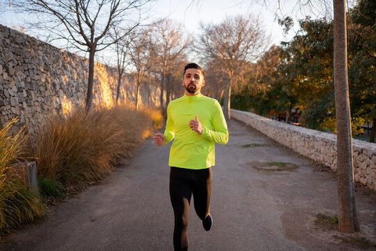 Young man running in the city