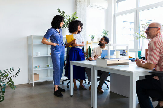 Collaborative Office Meeting With Diverse Team