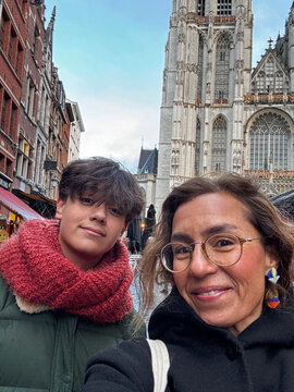 Tourists Take Selfie Near St. James Cathedral in Antwerp, Belgium