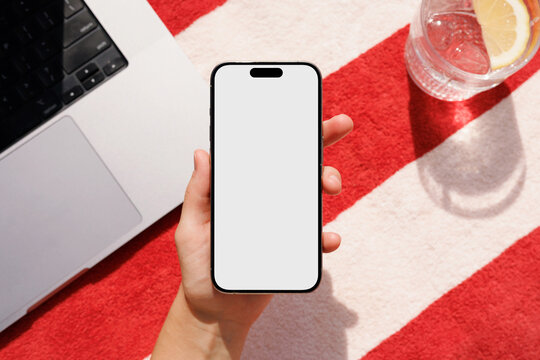 Hand holding smartphone with white  screen