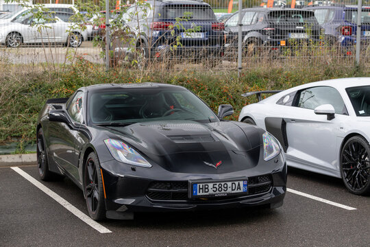 Nancy, France - October 26th 2025 : View on a black Chevrolet Corvette C7 parked on a street. The Chevrolet Corvette C7 is the seventh generation powered by a 6.2-litre V8 engine.