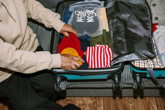 Preparing luggage for a trip at home