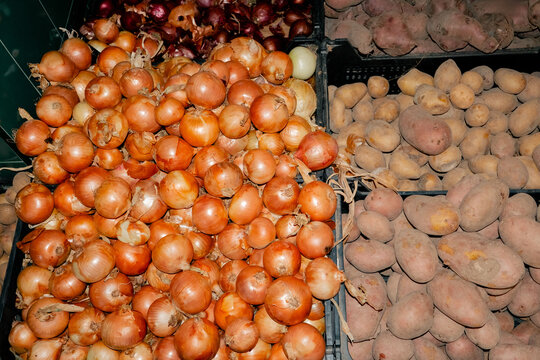 Pile of Onions and Dirty Potatoes