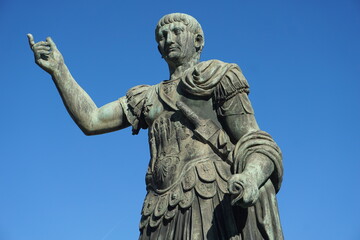 Obraz premium Close up of the historic bronze statue of the ancient Roman emperor Trajan in the Foro Romanum, Roman Forum, on a sunny day