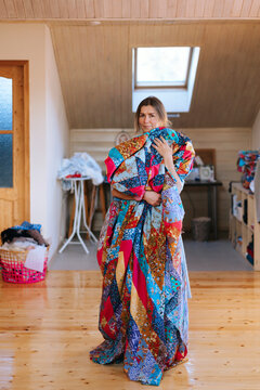 Quilted Beauty Wrapped in Vibrant Colors Inside a Cozy Studio
