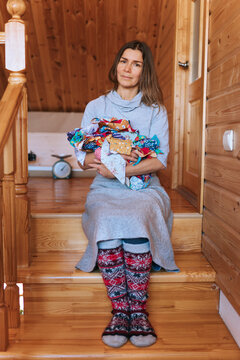 Warm Woolen Socks and Bundles of Joy on a Cozy Staircase