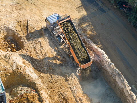 Dump Truck Unloading Rocks Sand Gravel Facility Aerial