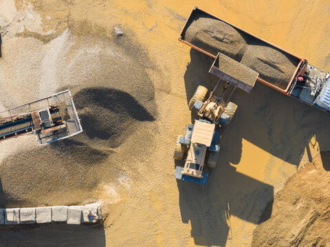 Aerial Loader Filling Truck at Gravel Quarry