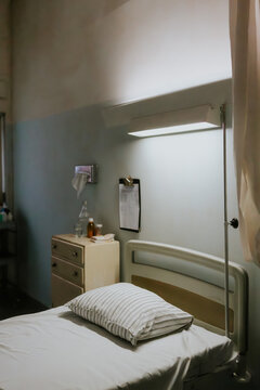Hospital room with bed and medical supplies