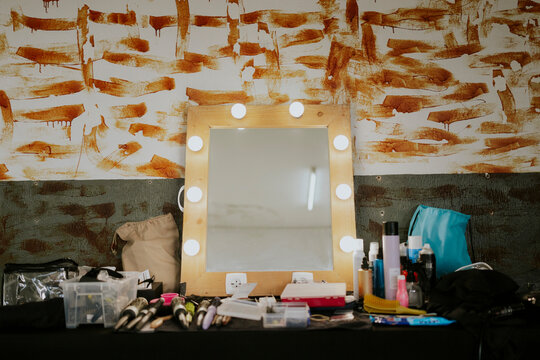 Dressing room vanity with makeup and lighting setup
