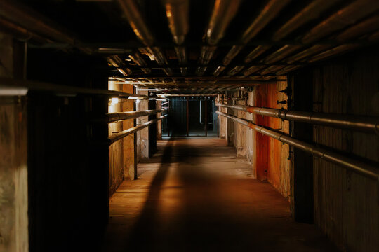 Industrial corridor with overhead pipes