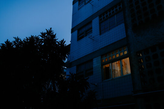 Night view of building with illuminated window