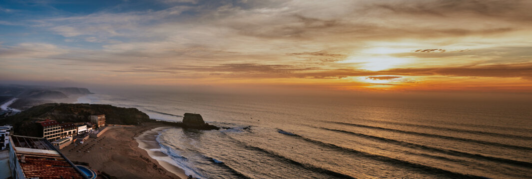 Scenic coastline view at sunrise over Atlantic Ocean in Vimeiro