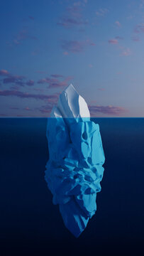 Iceberg stands tall in the blue sea under the clear sky