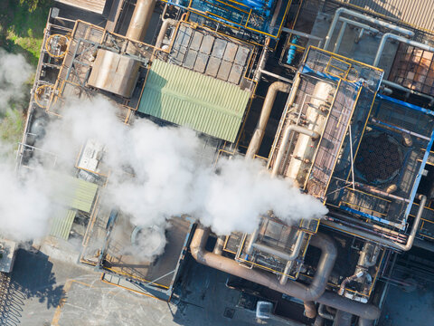 Aerial View of Industrial Plant with Steam Emission