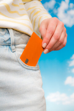 Inserting orange card into front pocket