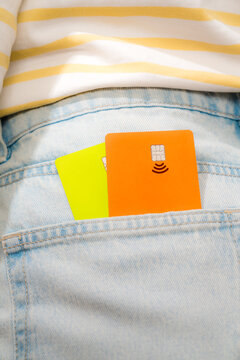 Two cards in denim back pocket