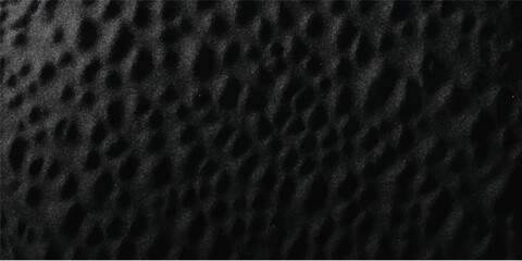 Seamless black and white macro leopard skin texture featuring a natural animal fur pattern on a dark textured surface for a rough material backdrop © FS