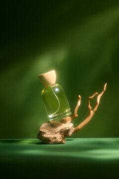An elegant perfume bottle displayed on a natural wooden