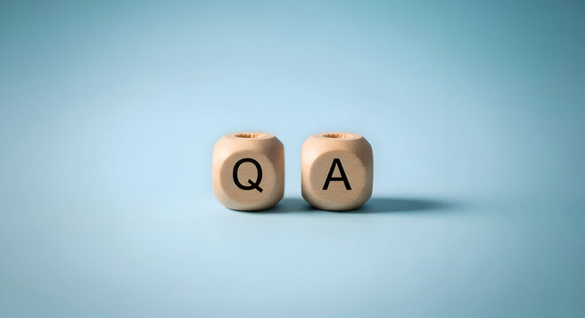 Two Wooden Blocks with Q and A Letters on a Light Blue Q and A, question, answer, wooden blocks