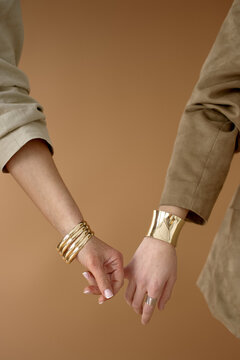 Elegant Hands with Gold Jewelry