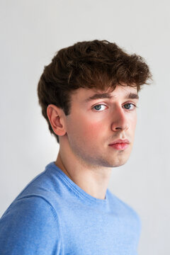 Portrait Of A Young Man In Blue Sweater