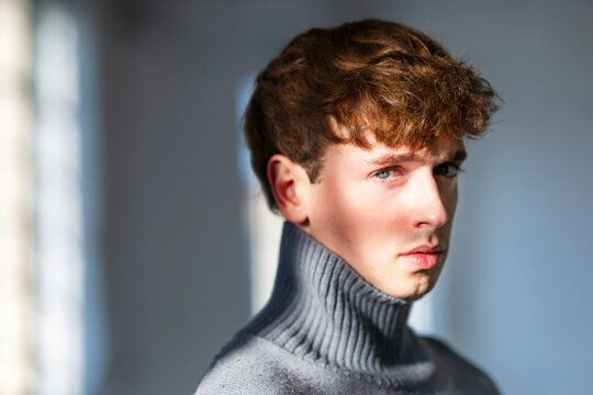 Portrait Of A Man In Gray Turtleneck Sweater