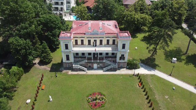 The Castle of Culture captured from above, Vrnjacka Banja, Serbia. Aerial fotage, flying backwards.