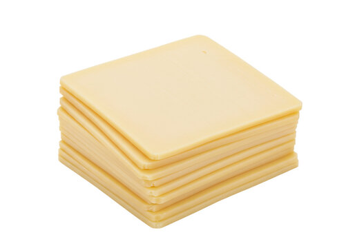 Neatly arranged creamy pale yellow, perfectly square processed cheese slices on a seamless transparent background with copy space, minimalist studio setting, commercial product photography concept