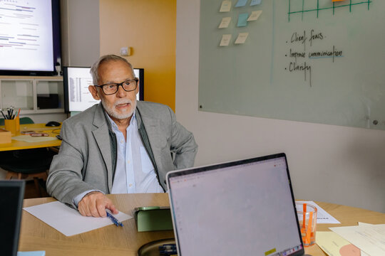 Senior in Modern Office