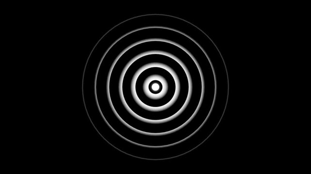 Concentric white circles radiating from center on black background